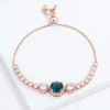 Exquisite Rose Gold Slider Bracelet with Blue-Green Center Stone by migems international